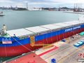 8万吨多用途粮食运输船“国强海”轮在大连命名